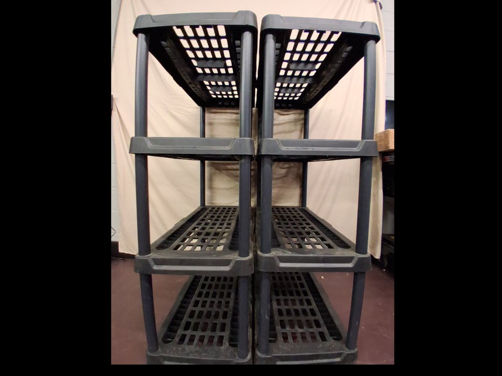 2 black plastic 4 tier shelves