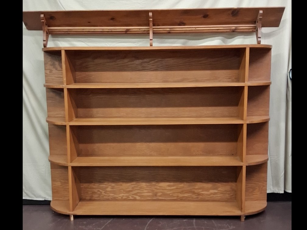 5 tier wooden shelf w/ round sides and a