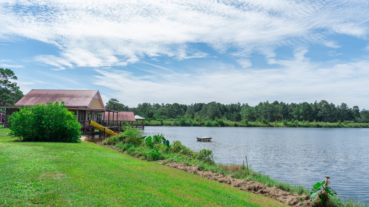 Image for Indian Lake Retreat - Waterfront Colonial Brick Home in Colquitt County, Georgia