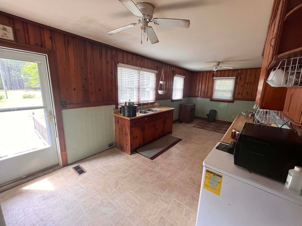 Image for 43 acres in Harnett County with a brick home in an onsite live /online / simulcast auction event!