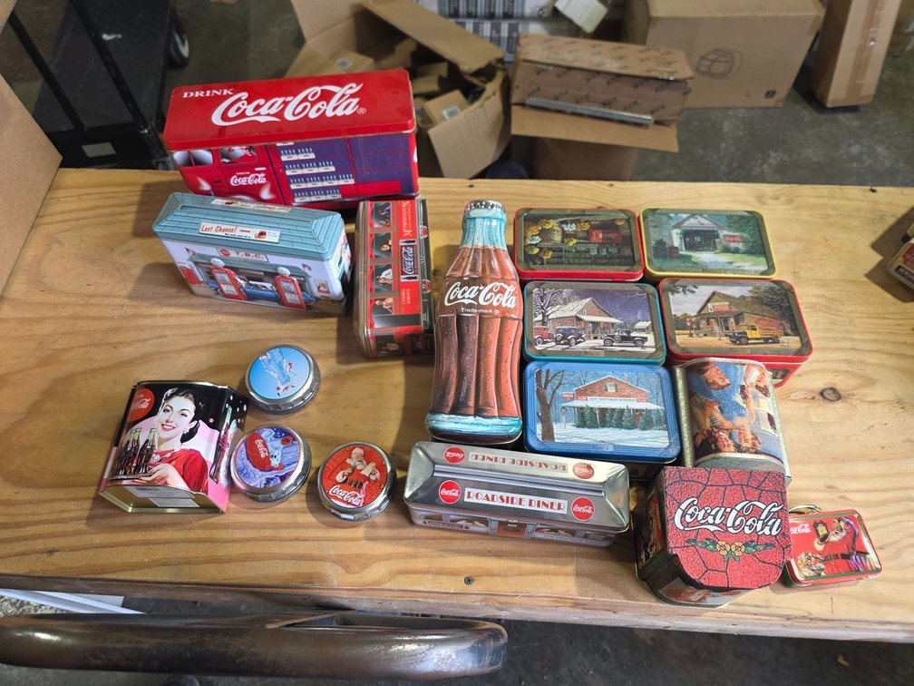 Vintage metal coke tins