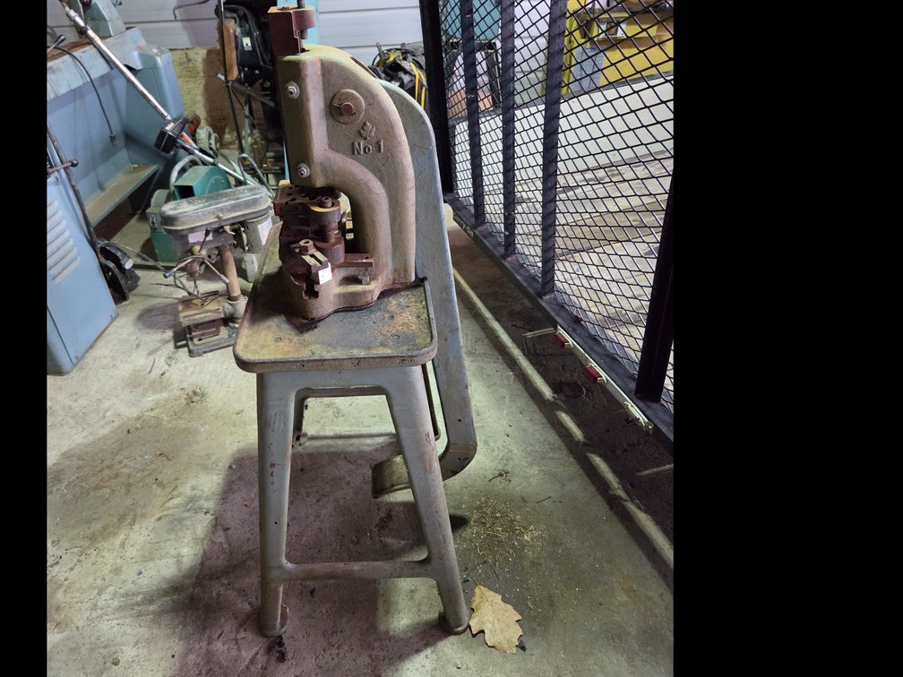 Kick / Punch Press mounted on a cast-iron floor stand