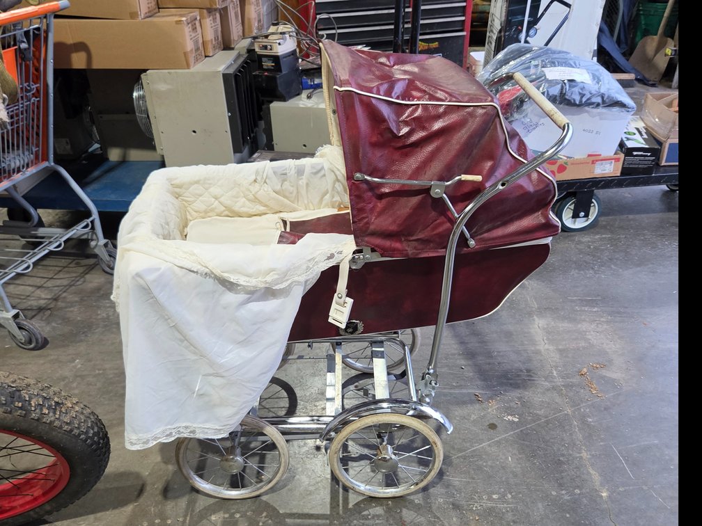 vintage burgundy vinyl and chrome baby carriage
