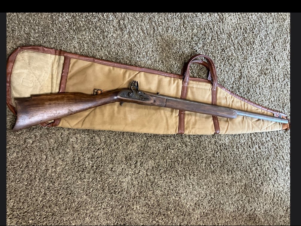 50 caliber flintlock with case.