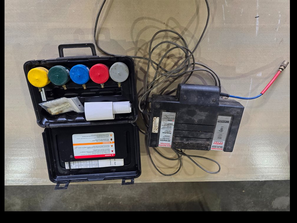 Waekon fuel cap test system