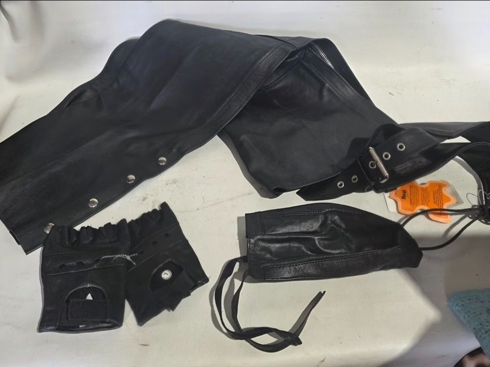 Unused set of black leather chaps, gloves, skull cap R3B