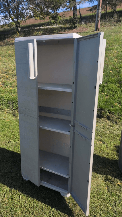 Outdoor plastic cabinet with shelving