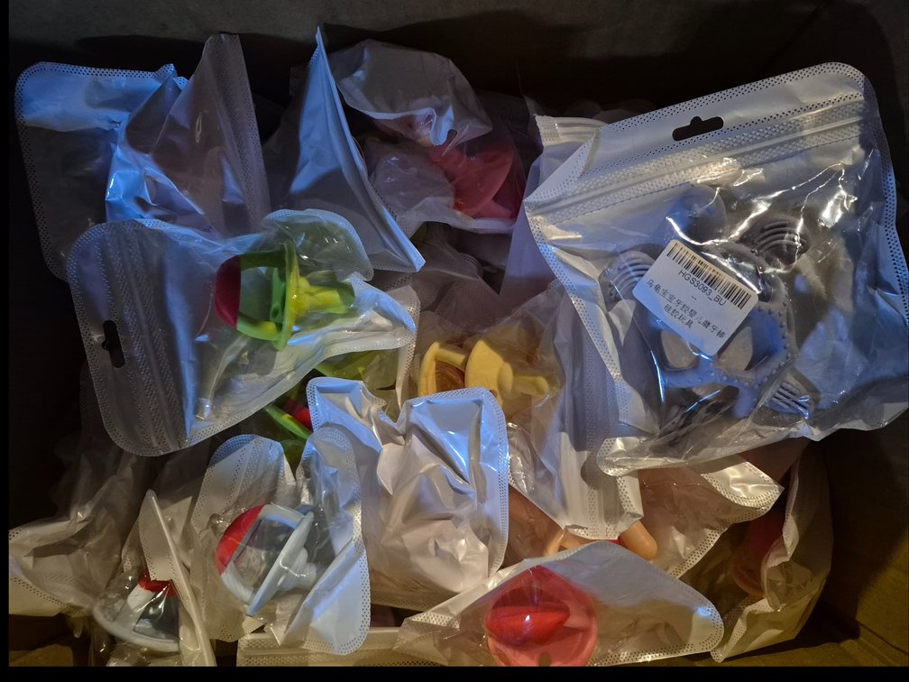 40 plus pcs baby pacifiers and toys