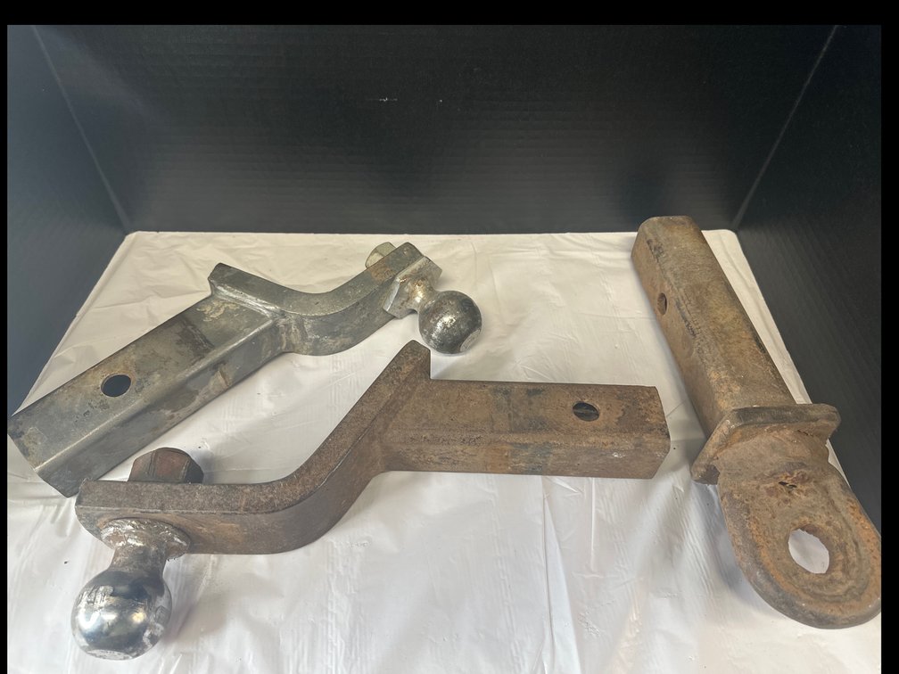 3 draw bar hitches.  Two have trailer balls.
