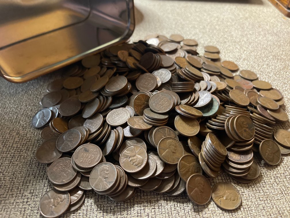 Wheat and Other Pennies in Metal Tea Box