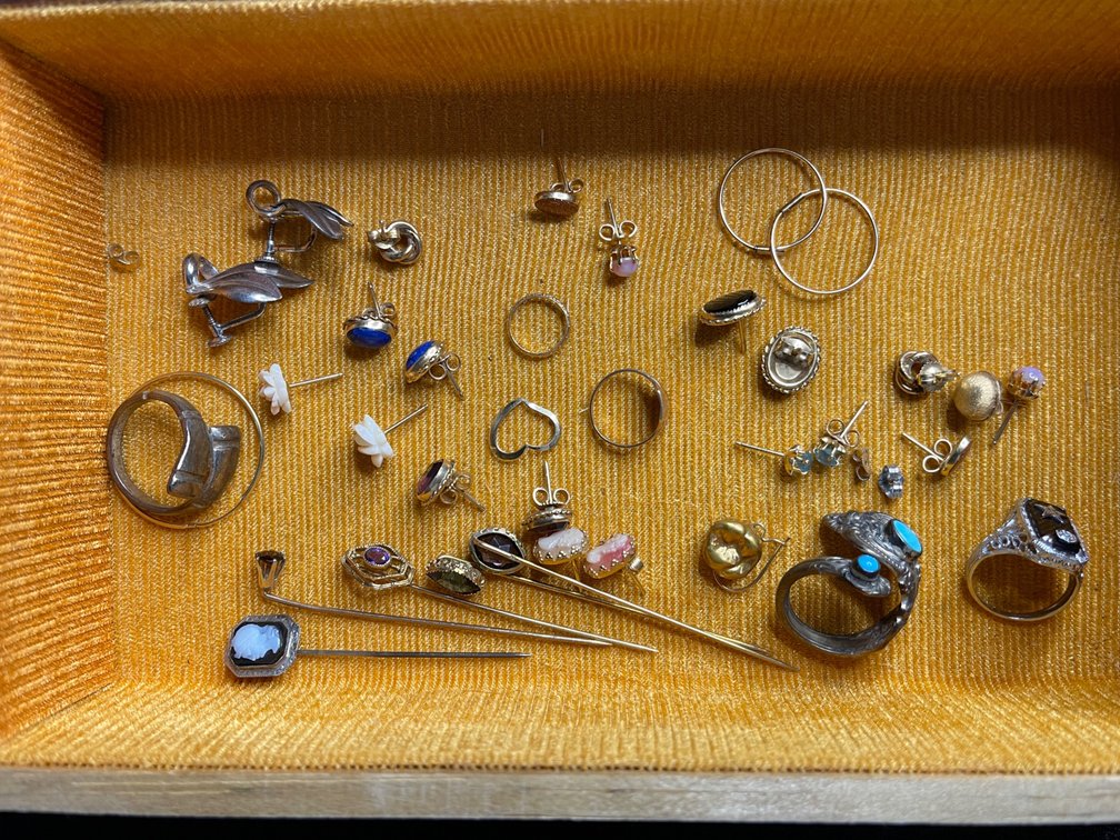 Rings, earrings, pins.