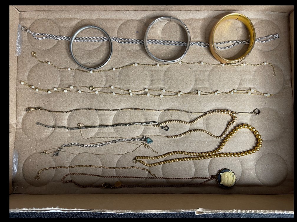 Necklaces and Bracelets in cardboard flat