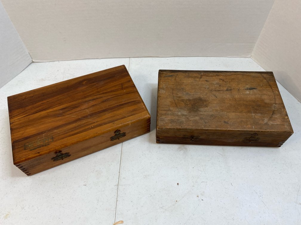2 wooden boxes of drill bits 