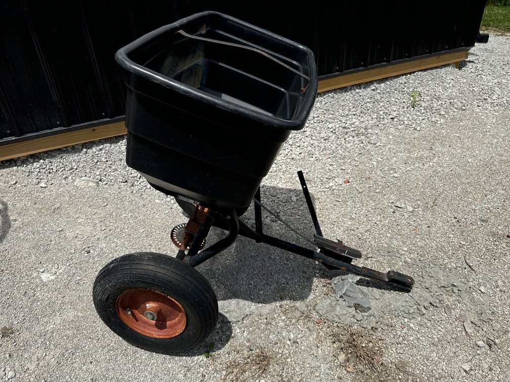Lawn spreader, plastic composite