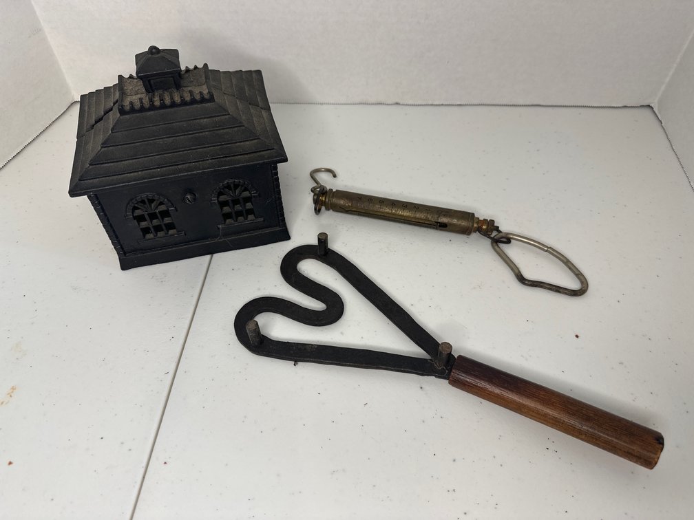 Cast Iron Decorative Bank, Cast Iron Wooden Handle Trivet, and Vintage Brass Fish Scale