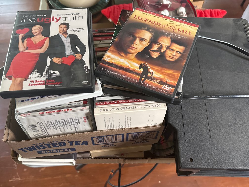 CDs and Movie Collection with Magnavox DVD/VHS Player