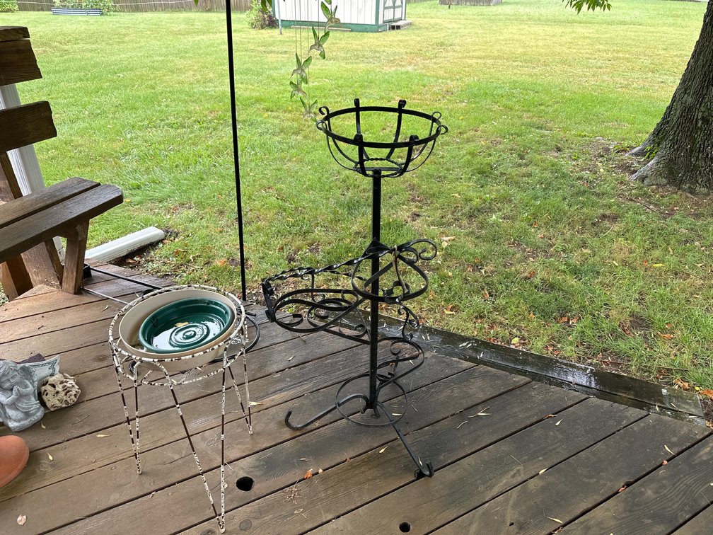 3 shepherd's hooks and one plant stand
