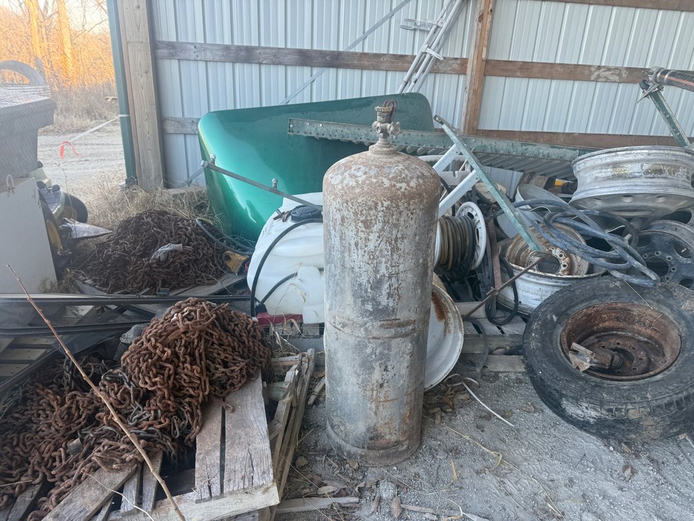 Lg pile of scrap in corner of R&B Shed