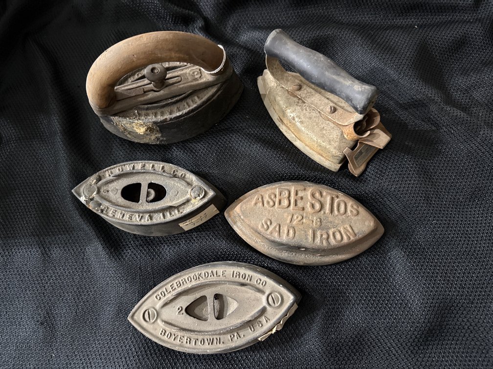Collection of cast iron sad irons