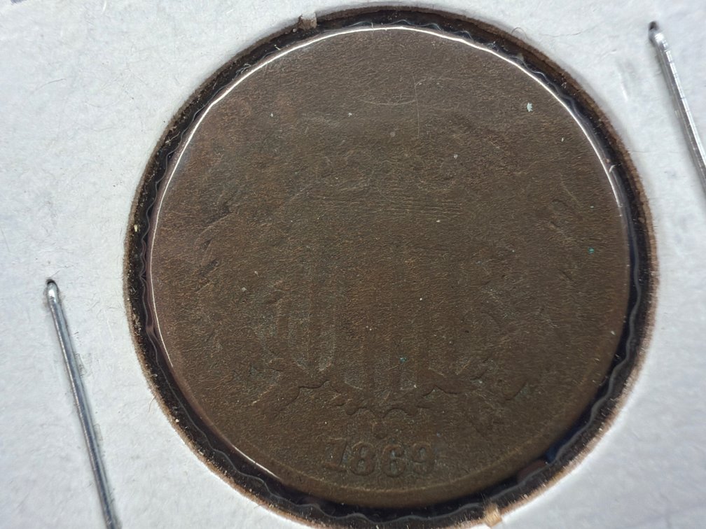 Shield. Two cent piece.