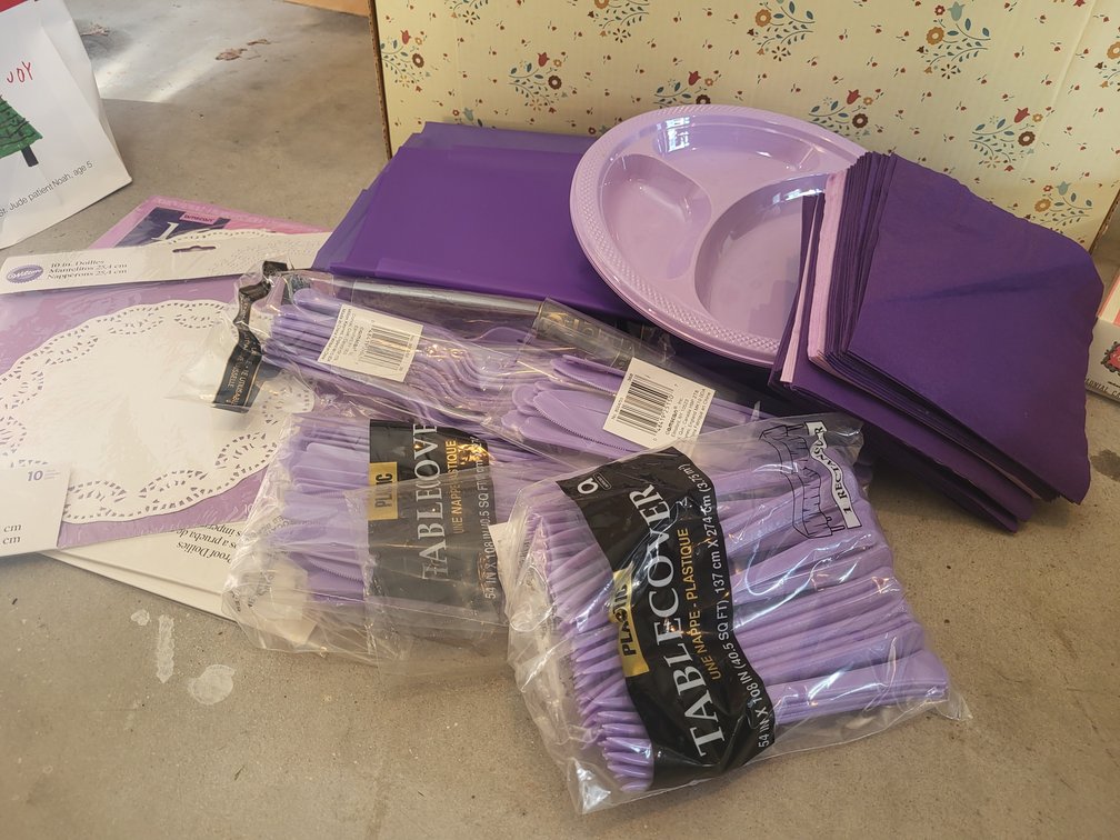 Assorted paper and plastic  party supplies
