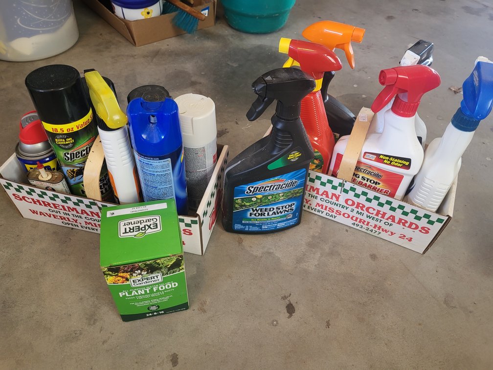 Variety of bug sprays, watering cans and more