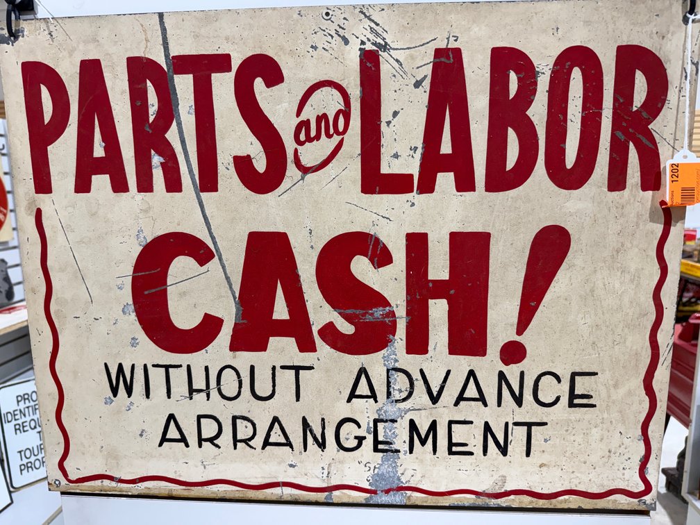 Parts and Labor Metal Sign