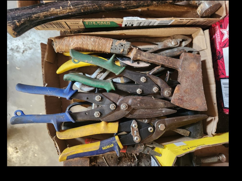 flat of steel cutters, mallets and a vintage axe 