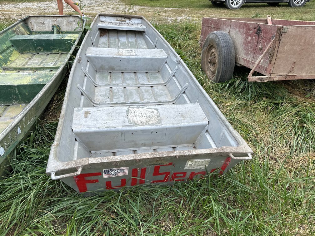Gray and Red Metal Jon Boat Outside placeholder