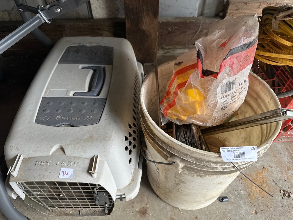 pet taxi with bucket of electric fence wire