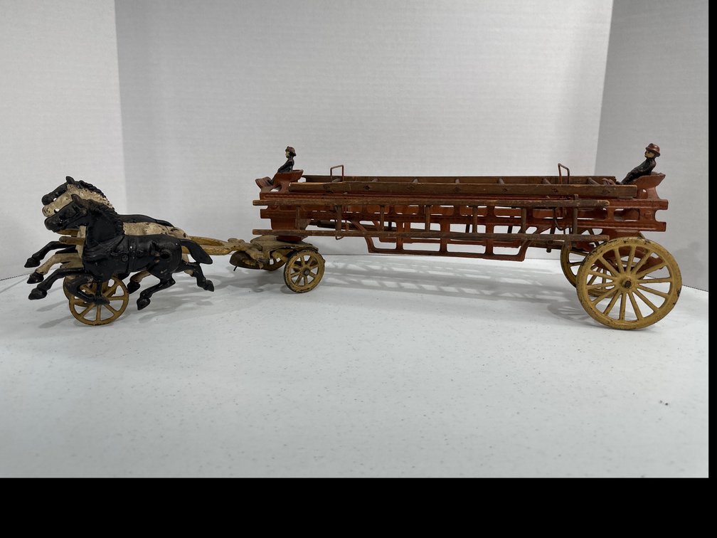 large original cast iron fireman's wagon