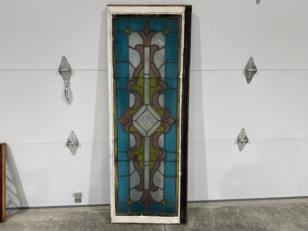 large stained glass window and frame