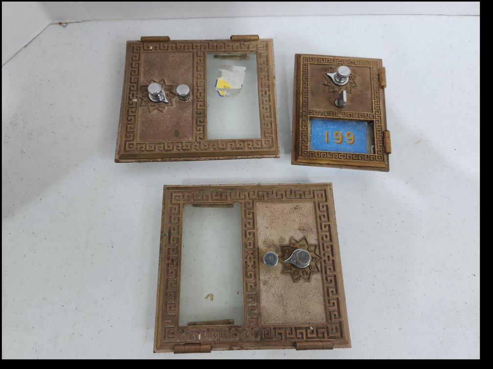 flat of brass post office box fronts for making banks 