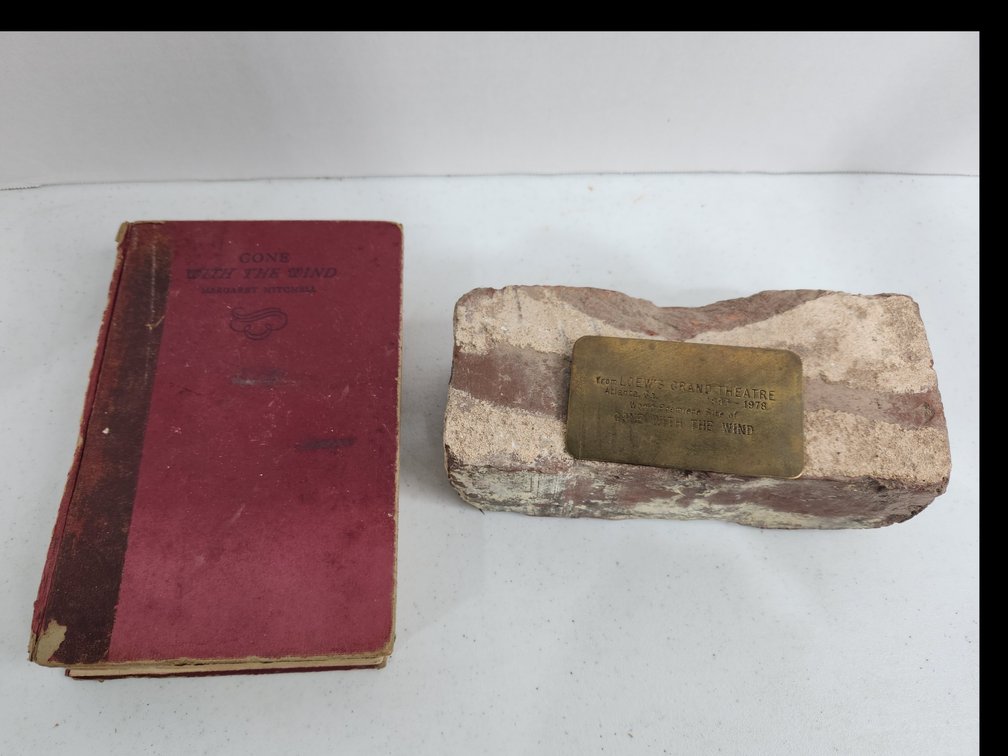 gone with the wind book and brick from Loew's grand theatre 