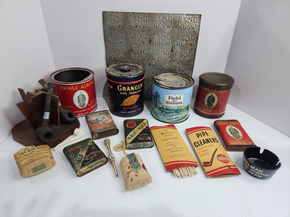 lot of tobacco tins, pipes and accessories