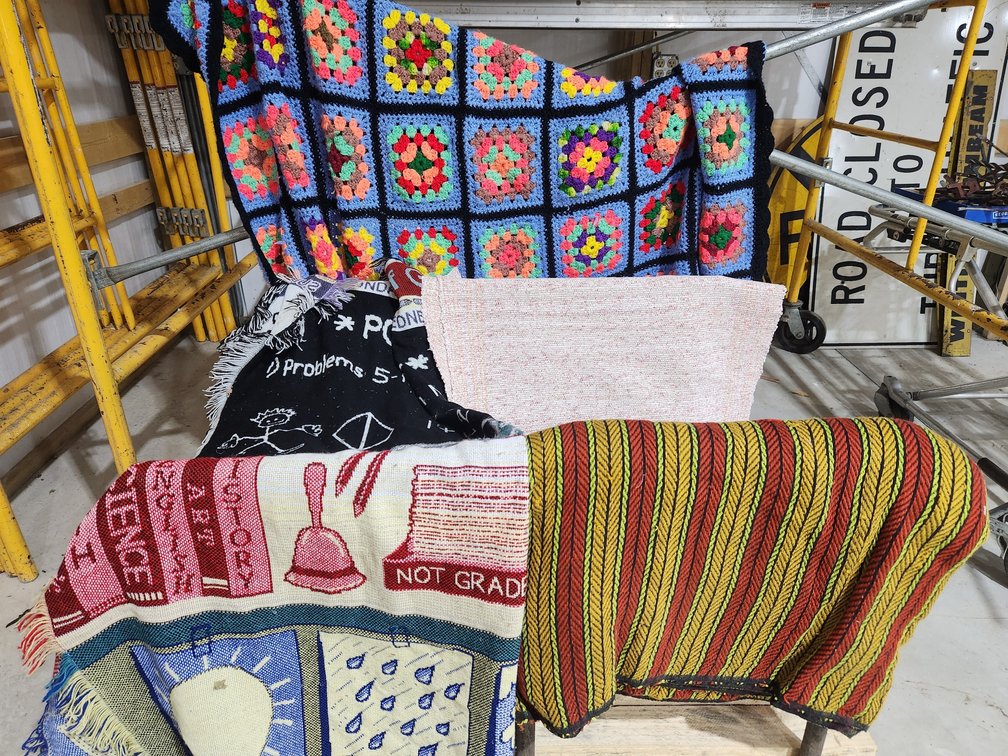 Afghans, table cloths, Doiley's, blankets, and rugs