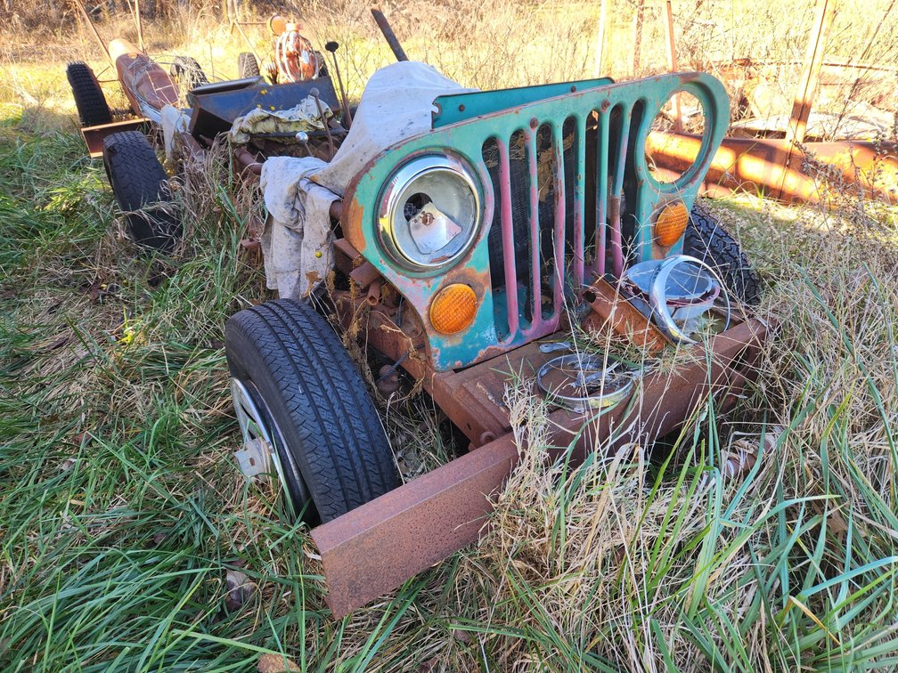 Jeep Frame on wheels, has engine and transmission