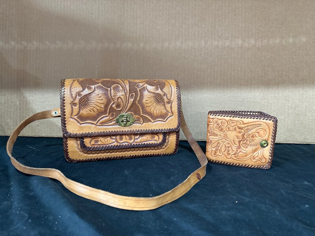 Leather purse and vintage tapestry