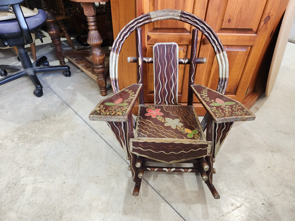 Child rocker painted with flowers
