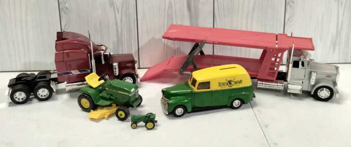 (3) Ertl John Deere Toys & (2) Long Haul Trucks