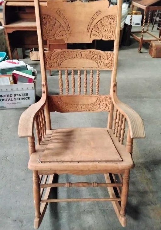 Carved Oak Pressed-Back Rocking Chair