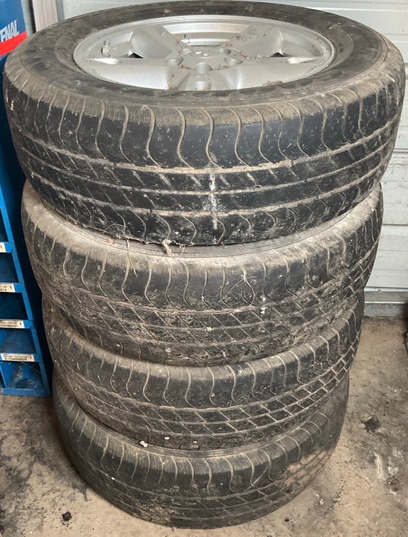 Set of Goodyear Wrangler HP P235/65R17 Tires With Dodge Rims