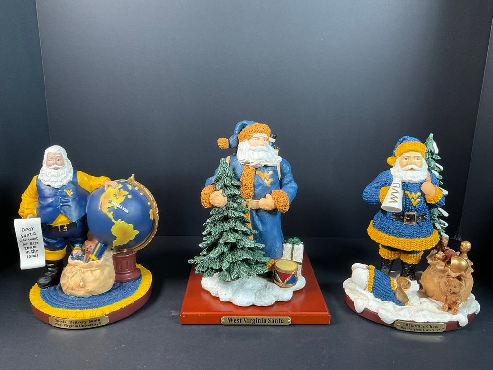 The Memory Company 2006 Special Delivery Santa Ninth In A Limited Series & 2002 Christmas Cheer Fourth In A Limited Series Figurines With A 1998 Collegiate Collectables First In A Limited Series West Virginia Santa Figurines