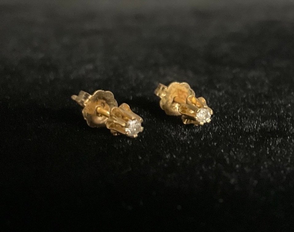 Pair of Small 14K Diamond Stud Earrings