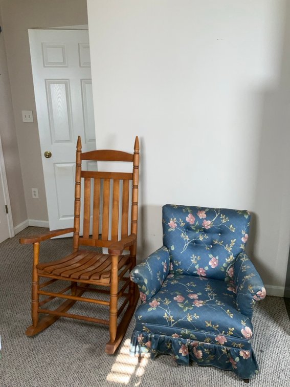 Wooden Slat Back Rocking Chair and Floral Upholstered Accent Armchair