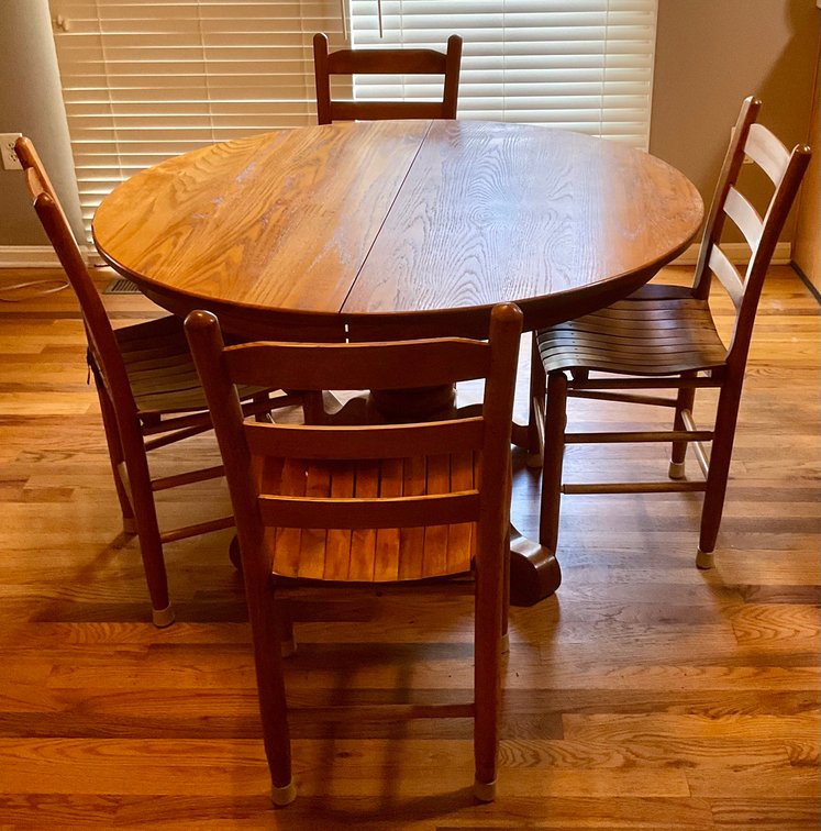 Solid Oak Round Pedestal Dining Table and Four Ladder Back Chairs