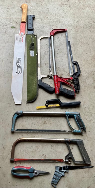 Assorted Hand Saws, Hacksaws, Machetes and Cutting Tools Lot