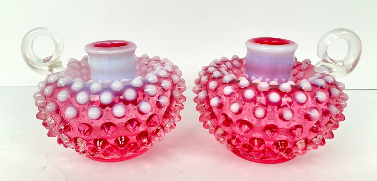 Pair of Fenton Cranberry Opalescent Hobnail Candlestick Holders
