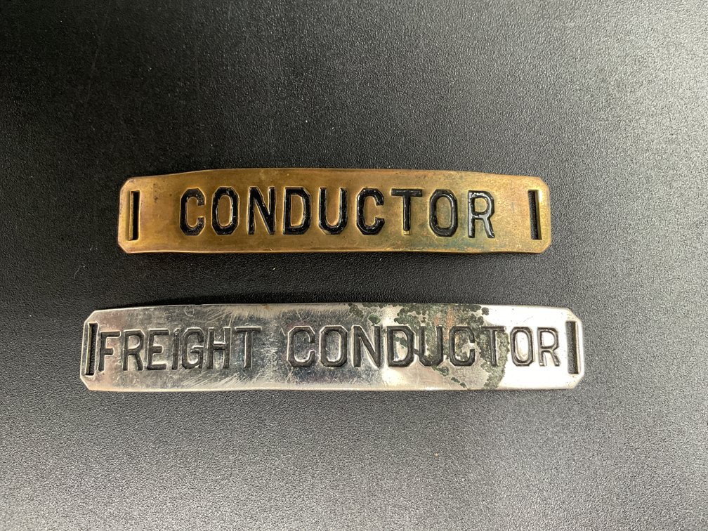 Two Railroad Hat Badges