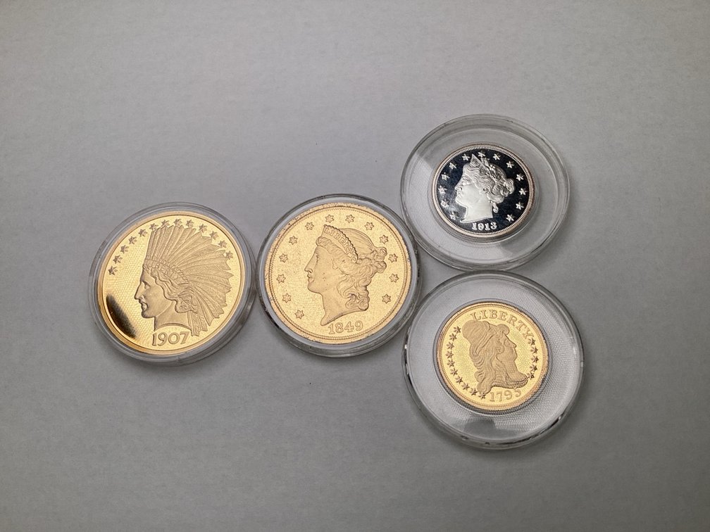 Two .999 1oz Silver Rounds and Two .25 oz Silver Rounds
